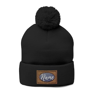 Wave Patch Pom-Pom Knit Cap | Embroidered Oval Logo