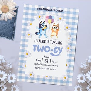 May include: A birthday invitation with a blue and white gingham border. The invitation features cartoon characters and the text "Eleanor is turning TWO-ey" with the date August 31st. The invitation also includes RSVP information.