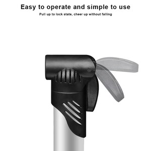 May include: A black and silver bicycle pump nozzle featuring a locking lever mechanism. The text at the top reads: Easy to operate and simple to use. Pull up to lock state, cheer up without falling. The nozzle has a ribbed black plastic head.