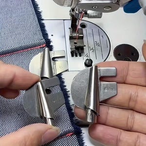 May include: Three silver-colored metal sewing machine hemmer feet attachments with conical guides. Each attachment features a flat, semi-circular base with a slotted opening and a tapered metal tube for folding fabric edges during the sewing process.