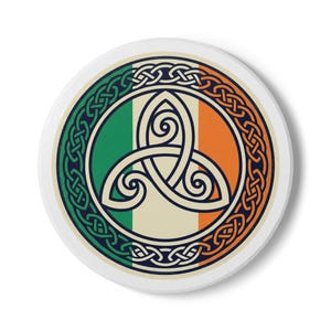 May include: A round white coaster featuring the Irish flag colors of green, white, and orange. The design includes a Celtic knot border and a central Triquetra symbol, a traditional Irish emblem.