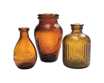 A collection of 3 original vintage amber coloured jars. Kitchen retro decor.