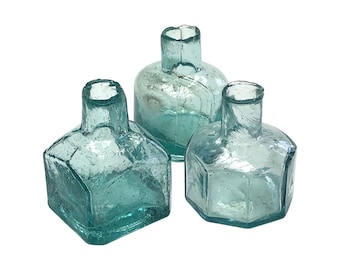 Set of 3 vintage glass ink pots, height of tallest is 2 1/4 inches, 55 mm.
