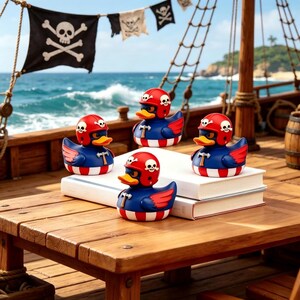 May include: Four rubber ducks wearing red helmets with white skull and crossbones emblems. The ducks have blue bodies with red wings and a white and red striped base. Each duck features a small brown hammer icon on its chest and a yellow beak.