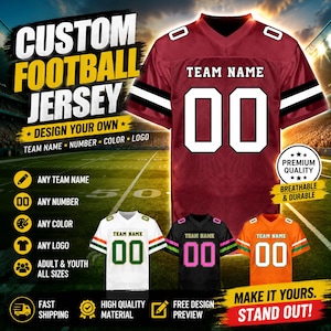 May include: A maroon football jersey with white numbers 00 and the text TEAM NAME on the chest, featuring black and white sleeve stripes. Below, three additional jerseys are shown in white with green, black with pink, and orange with green accents.