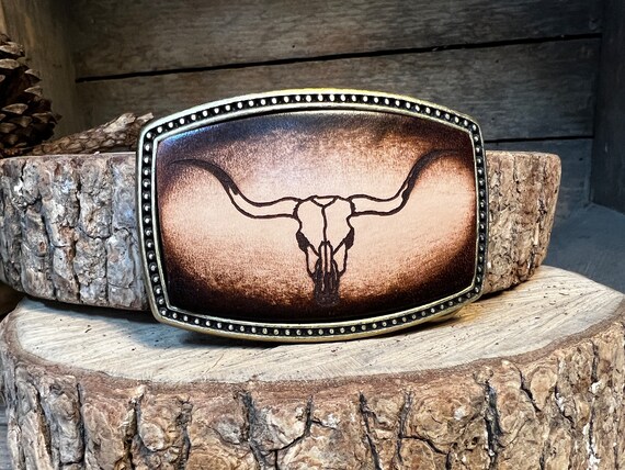 Steer belt clearance buckle