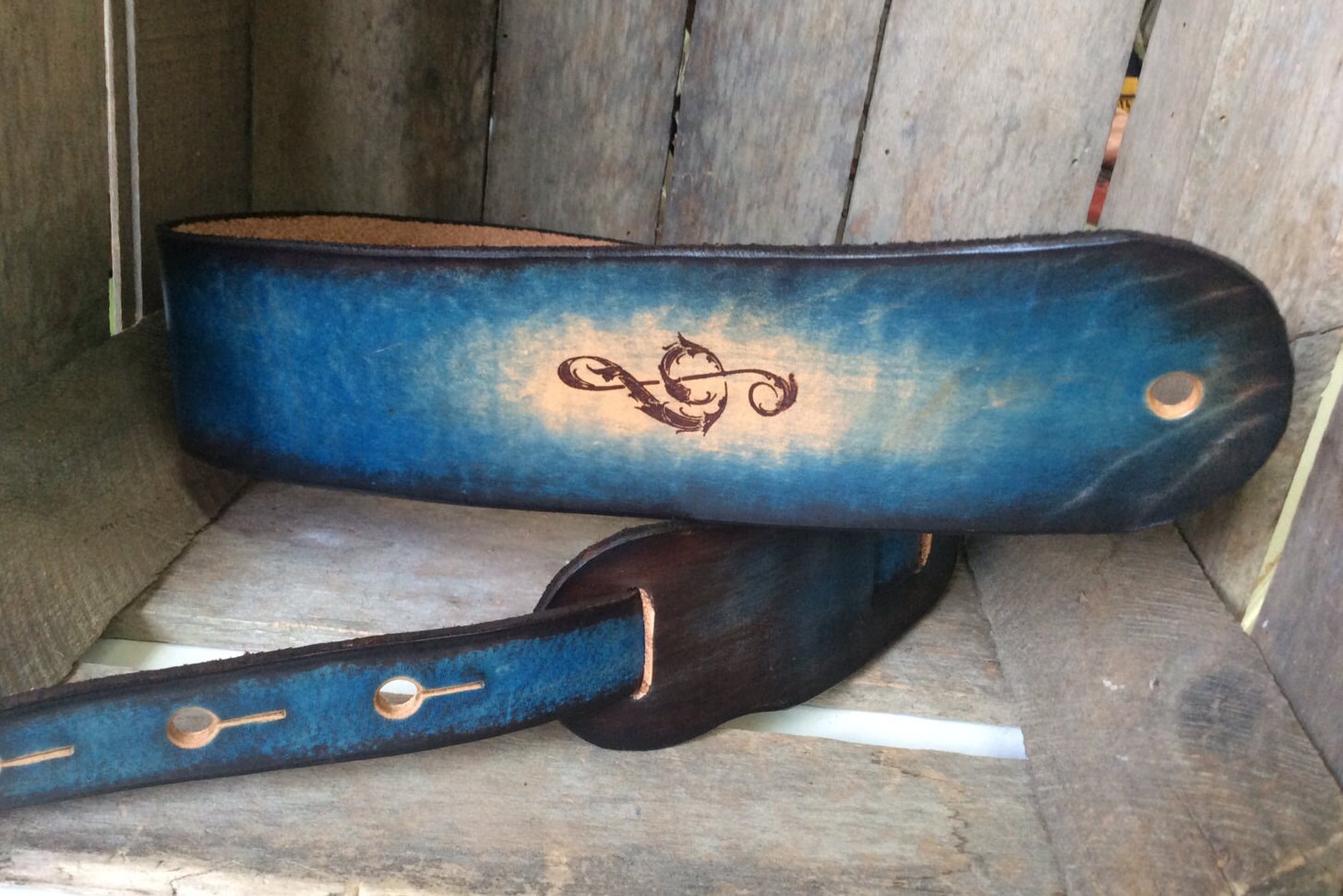 Personalized Leather Guitar strap in a dark turquoise blue.