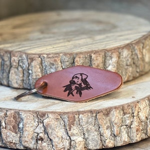 Leather motel keychain with duck dog