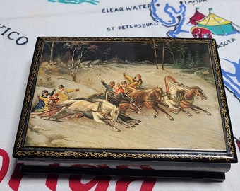 Vintage Hand-Painted Russian Black Lacquered Ornate and Detailed Winter Sleigh Races Themed Rectangular Trinket Box Signed