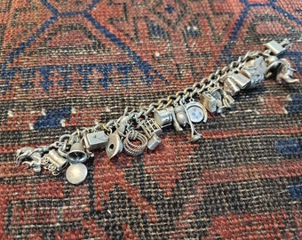Antique Articulated Loaded Mostly Sterling Silver Story Charm Bracelet Stanhope World's Fair Liberty Bell MailBox Bird in Cage Church Charms