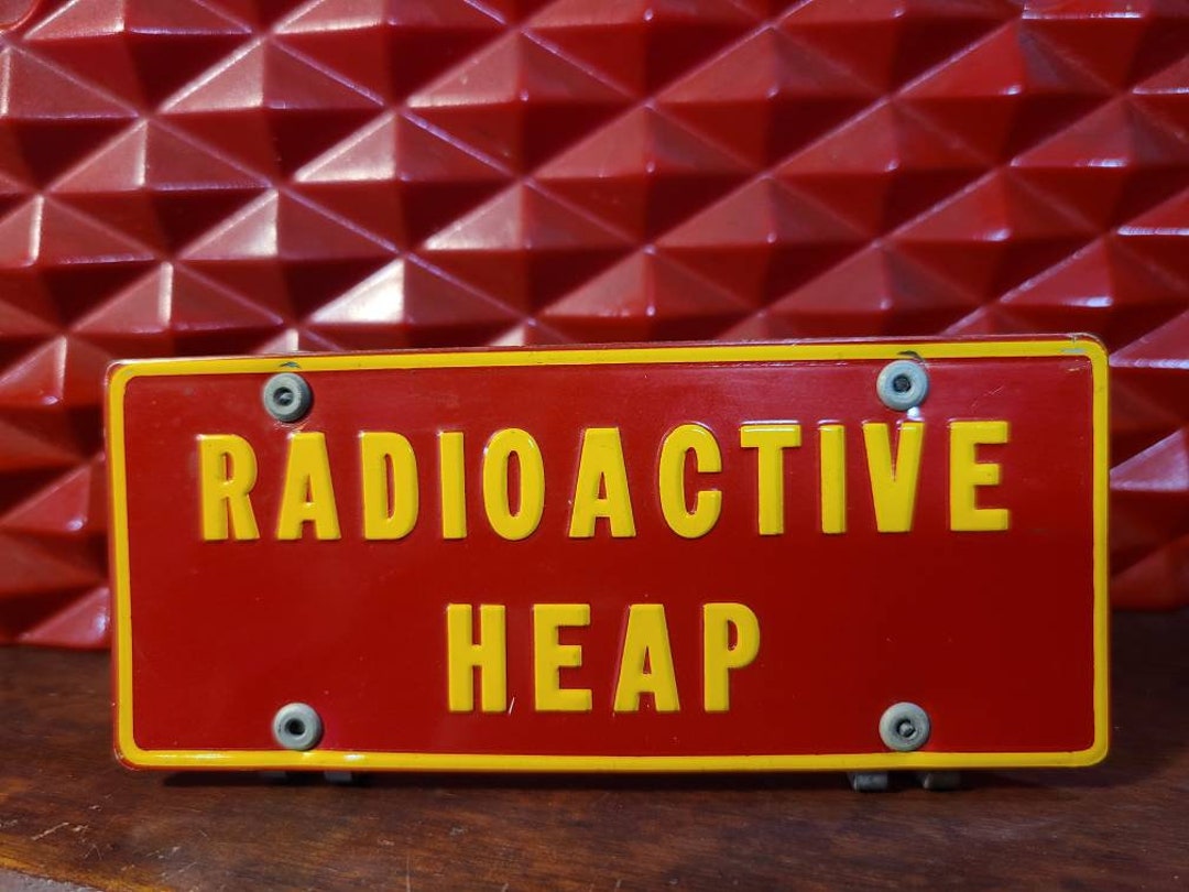 Vintage Radioactive Heap Badge Raised Relief Tin Sign Etsy