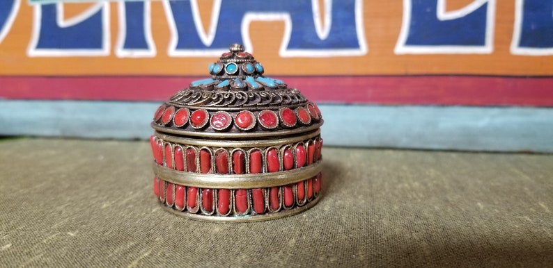 Vintage Chinese Tibetan Nepalese Brass Filigree Turquoise and Coral Colored Beaded Small Round Beast Flower Jeweled Prayer Trinket Box