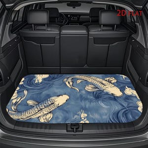 May include: A rectangular car trunk cargo mat featuring a blue water-themed background with white koi fish and swirling wave patterns. The mat is positioned on the floor of a vehicle cargo area. The text 2D FLAT is visible in the top right corner.