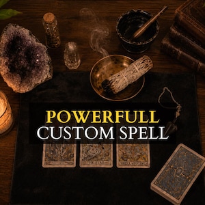 May include: A black mat featuring the text POWERFULL CUSTOM SPELL in yellow and white, surrounded by three tarot cards, a deck of cards, a burning sage bundle in a brass bowl, a lit candle, a large amethyst geode, and old leather-bound books.