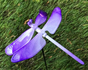 A white and purple Metal Dragonfly Sculpture Lawn Stake