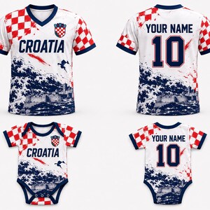 May include: A white V-neck jersey and a baby bodysuit featuring a red and white checkered pattern, the text CROATIA, a crest, and a graphic of dark blue ocean waves with a coastal fortress. The back displays the text YOUR NAME and the number 10.