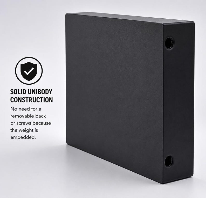 May include: A rectangular black object with a solid unibody construction, featuring two circular openings on the side. Text on the image reads: SOLID UNIBODY CONSTRUCTION. No need for a removable back or screws because the weight is embedded.