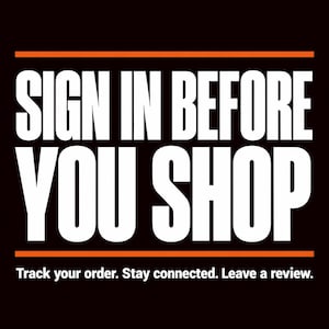 May include: A black square sign featuring the white text SIGN IN BEFORE YOU SHOP in a bold, sans-serif font, framed by two horizontal orange lines. Below, the white text reads: Track your order. Stay connected. Leave a review.