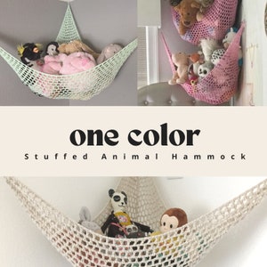 May include: Three stuffed animal hammocks in different colors: light green, pink, and beige. The hammocks are made of crocheted string and are hanging on a wall. The text "one color Stuffed Animal Hammock" is displayed below the images.