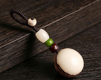 Bodhi tree keychain, natural ivory, bodhi, and sandalwood woven bag pendant, simple Chinese-style car rearview mirror decoration.