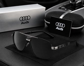 Audi logo square polarized car sunglasses, available in a variety of colors, provide UV protection.