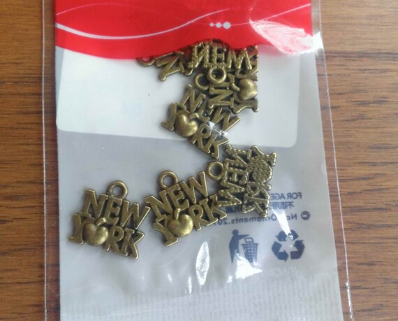 10 New York charms antique bronze tone BC18