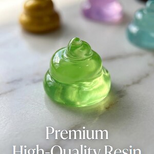 May include: A translucent lime green resin figurine shaped like a coiled swirl, positioned in the foreground. In the background, additional resin figurines in gold, purple, and blue are visible. The text "Premium High-Quality Resin" is displayed.