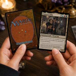 May include: Two Magic: The Gathering trading cards. One card shows the classic orange and brown back design with the Magic logo. The other card features a custom illustration of a couple, titled Anna & John, with text describing game abilities.