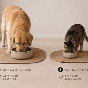 May include: Two beige ceramic pet bowls on oval woven mats. The large bowl is 7.5 inches wide, 64 ounces, on a 15.7 by 27.6 inch mat. The small bowl is 5 inches wide, 12 ounces, on an 11.8 by 19.7 inch mat. Both bowls have a smooth, matte finish.