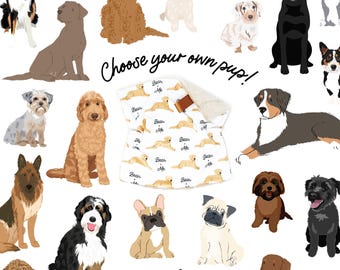 Może przedstawiać: Biały kocyk dla dziecka z brązowym paskiem i kremowym wnętrzem, z powtarzającym się wzorem ilustracji golden retrieverów i napisem "Bear Me". Fraza "Choose your own pup!" jest napisana czarnym skryptem.