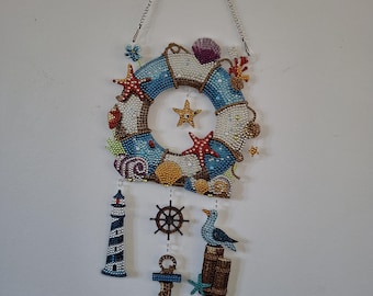 Arte de diamantes hecho a mano, energía del mar