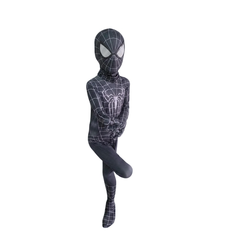 May include: A black and white Spider-Man costume. The full-body suit has a web pattern and a large spider emblem on the chest. The mask has white eye lenses. The costume covers the entire body, including the head and feet.