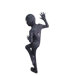 May include: A black and white Spider-Man costume. The costume has a black base with a white web pattern and a large spider emblem on the back. The mask has white eye lenses. The costume is a full body suit.