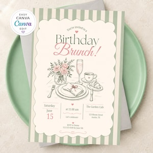 May include: A rectangular birthday brunch invitation card with a sage green and white striped border. The centre features a cream-coloured scalloped frame with a hand-drawn illustration of a table setting, including flowers, a glass, and a croissant.