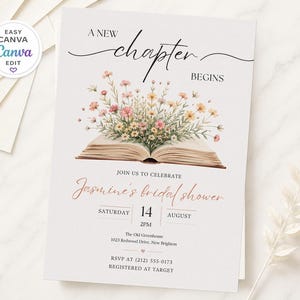 May include: A white invitation card featuring the text A NEW CHAPTER BEGINS above an illustration of an open book with a bouquet of pink and yellow wildflowers emerging from the pages. Below, the text reads JOIN US TO CELEBRATE Jasmine's bridal shower SATURDAY 14 AUGUST 2PM The Old Greenhouse 1023 Redwood Drive, New Brighton RSVP AT (212) 555-0173 REGISTERED AT TARGET.