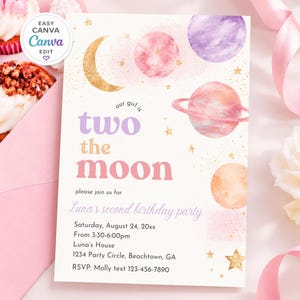 May include: A rectangular birthday invitation card featuring watercolor planets, a gold crescent moon, and gold stars. The text reads: our girl is two the moon, please join us for Luna's second birthday party, Saturday, August 24, 20xx, 3:30-6:00pm.