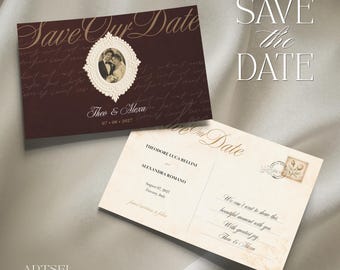 May include: A dark burgundy Save the Date card featuring a white ornate frame with a couple's photo, the text Theo & Alexa, and 07.08.2027. Beside it, a cream-coloured postcard with the text Theodore Luca Bellini and Alexandra Romano.