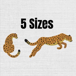 May include: Two embroidered cheetah designs in golden-brown with black spots. One cheetah is sitting with its tail curled, and the other is in a leaping pose. The text 5 Sizes is printed in bold black letters above the cheetah illustrations.