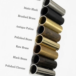 May include: A vertical arrangement of eight cylindrical metal tubes in various finishes, labeled as Brushed Chrome, Matte Black, Brushed Brass, Antique Patina, Polished Brass, Raw Brass, Black Brass, and Polished Chrome, showcasing distinct textures.
