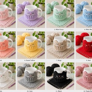May include: A collection of twelve white ceramic mugs, each featuring a matching crocheted cat-shaped cozy with fringe detailing. The set includes various colors: soft pink, lavender, mint green, baby blue, peach, pastel yellow, beige, red, white, grey, black, and dusty rose.