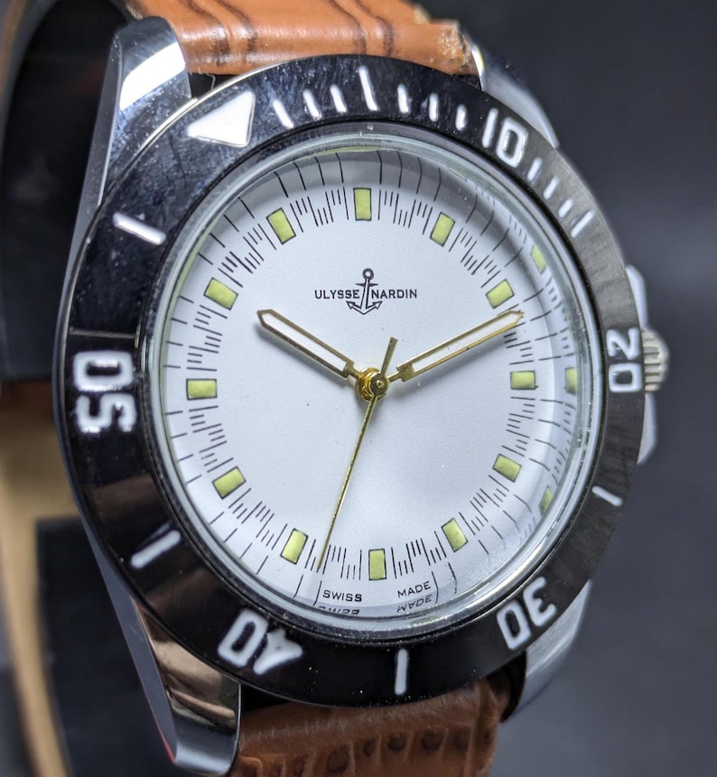 Rzadki, zabytkowy zegarek męski ULYSSE NARDIN z 17 kamieniami, wyprodukowany w Szwajcarii, z ręcznym naciągiem. zdjęcie 1