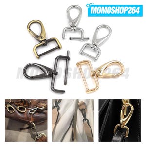 May include: A collection of five metal swivel lobster claw clasps in various finishes including antique brass, silver, gunmetal, and gold. The clasps feature rectangular loops and spring-loaded gates. Three smaller inset images show the clasps attached to bags.