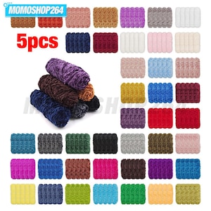 May include: A collection of 5-piece sets of yarn in various solid colors, including shades of blue, red, green, yellow, purple, pink, brown, black, white, and gray. The yarn has a textured, fuzzy appearance, and the image includes the text MOMOSHOP264 and 5pcs.