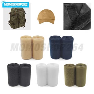 May include: A collection of hook and loop fastener rolls in beige, navy blue, black, white, and olive green. The image also displays a tactical backpack, a tan baseball cap, and a close-up view of the black textured hook and loop material.