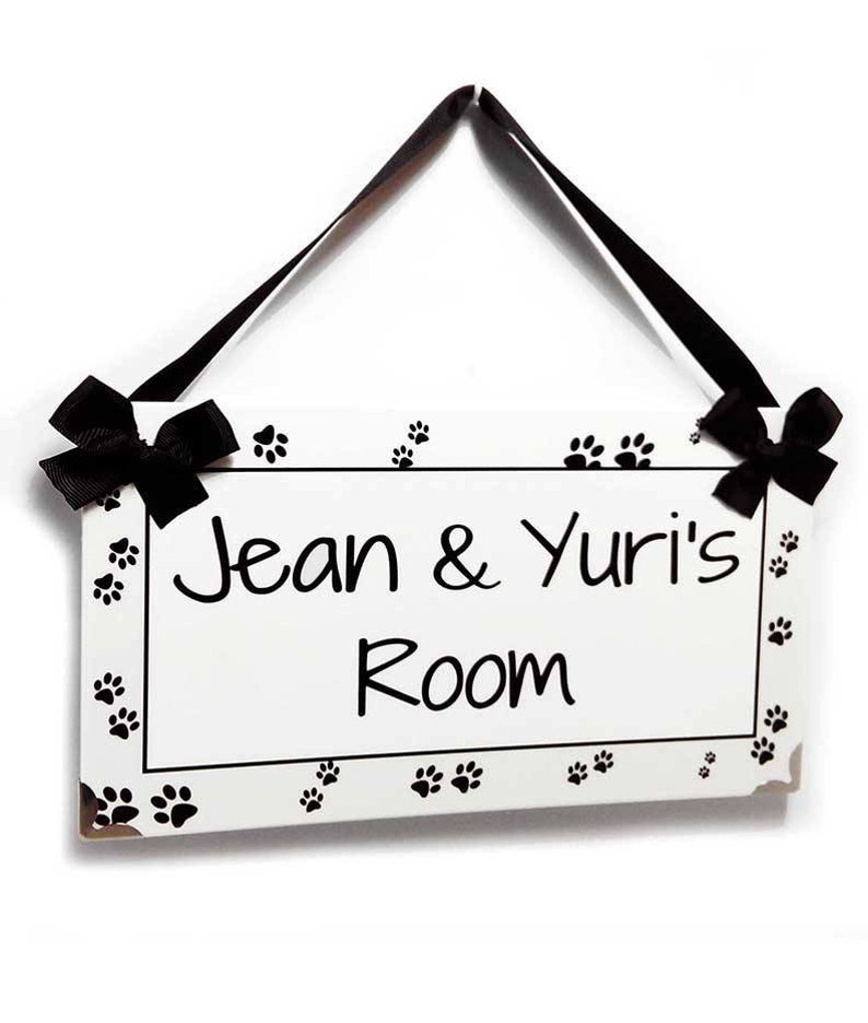 P2138 personalized white with black dog paws girls door sign