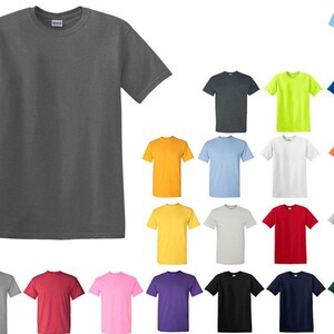 May include: A charcoal gray short-sleeve t-shirt is displayed prominently, with a variety of other solid-color t-shirts arranged around it. The shirts are in various colors, including yellow, blue, red, and green.