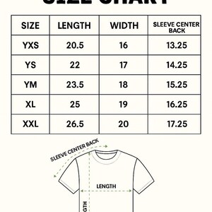 May include: A youth t-shirt size chart with a table listing sizes YXS to XXL, including length, width, and sleeve center back measurements in inches. Below the table is a line drawing of a t-shirt with arrows indicating measurement points.