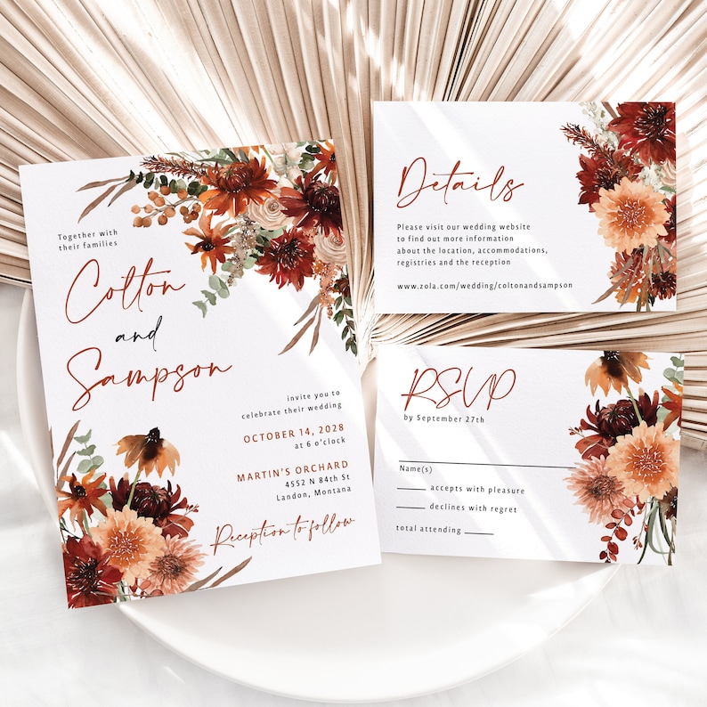 May include: Wedding invitation suite with a floral design featuring fall colors like orange, red, and brown. The invitation includes the names "Cotton and Sampson", the date "October 14, 2028", and the time "6 o'clock". The RSVP card includes a space for the guest's name, a checkbox to accept or decline the invitation, and a space for the total number of guests attending.