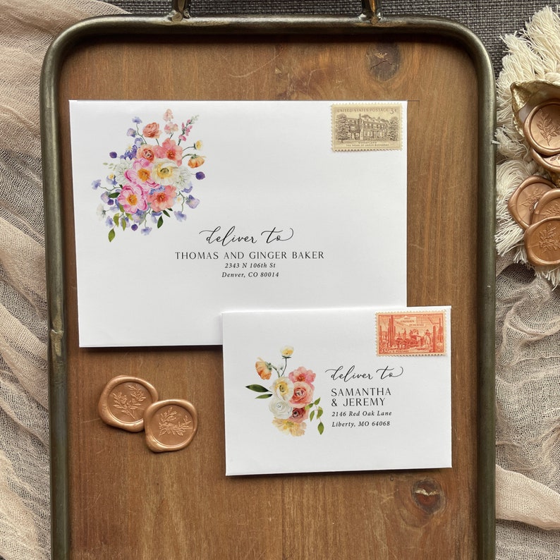 May include: Two white envelopes with floral designs and handwritten addresses. The top envelope reads "Deliver to Thomas and Ginger Baker 2343 N 106th St Denver, CO 80014". The bottom envelope reads "Deliver to Samantha & Jeremy 2146 Red Oak Lane Liberty, MO 64068".