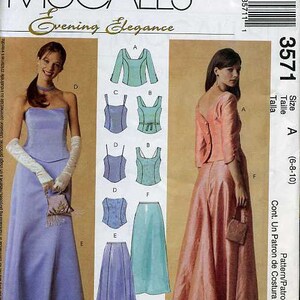 May include: McCall's Evening Elegance sewing pattern for a dress, size A (6-8-10). The pattern includes a bodice and skirt, with different options for each. The pattern is printed on white paper with black text.